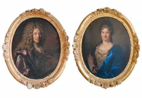 Pair of oval portraits of a man and a woman of quality