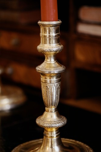 Lighting  - suite of four gilt bronze candlesticks
