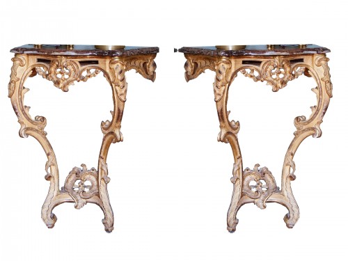 Pair of Louis XV giltwood consoles