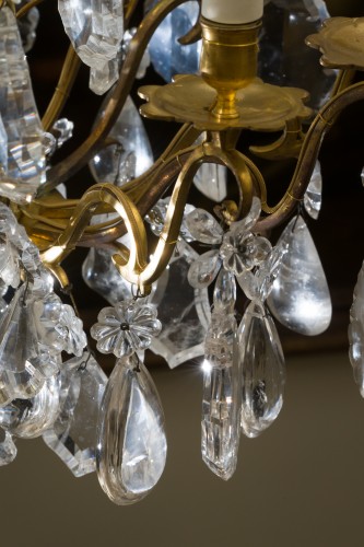 Lustre cage Louis XV à neuf bras de lumières en bronze doré et cristal de roche - Louis XV