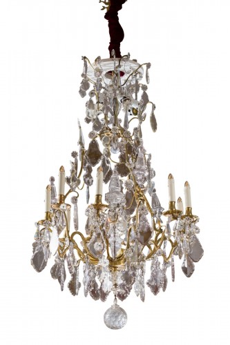 Lustre Louis XV en cristal et bronze doré à neuf bras de lumière
