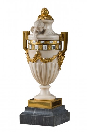 Pendule à cercles tournants en marbres blanc, bleu turquin et bronze ciselé et doré