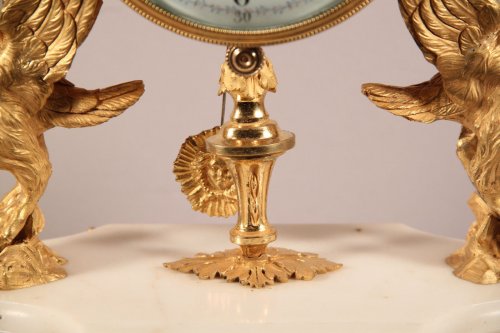 Horlogerie Pendule - Pendule en bronze doré de la fin du XVIIIe siècle ornée de phénix