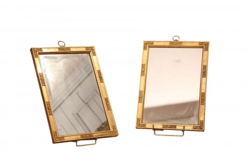 Pair of gilt bronze hanging mirrors