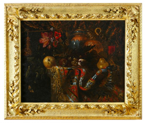 Nature morte au tapis, aiguière fruits et fleurs, attribué à Francesco Maltese (1611-1660)