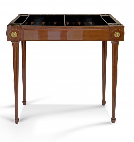 A late Louis XV solid mahogany games table by Denis Louis Ancellet, by 1770 - 