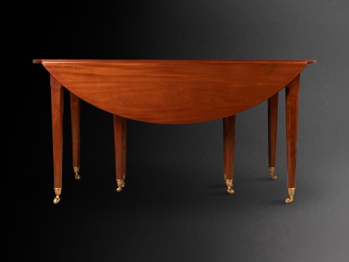 Furniture  - A Louis XVI solid mahogany extending dining table