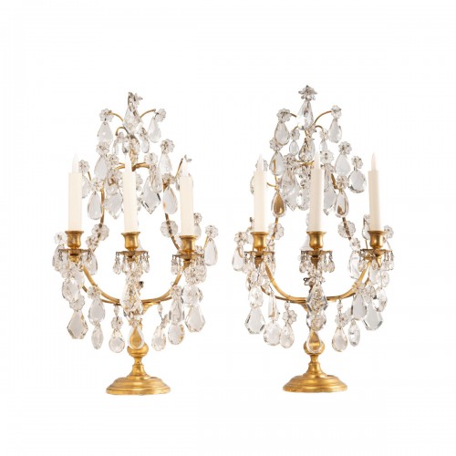 A pair of gilt-bronze and cut-crystal three-light girandoles