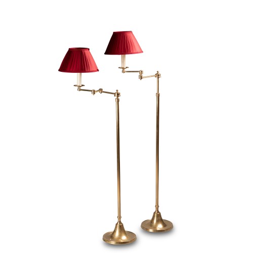 A pair of adjustable brass floor lamps