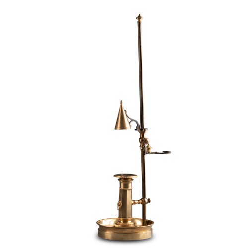 An Empire gilt-bronze candlestick with a mechanism