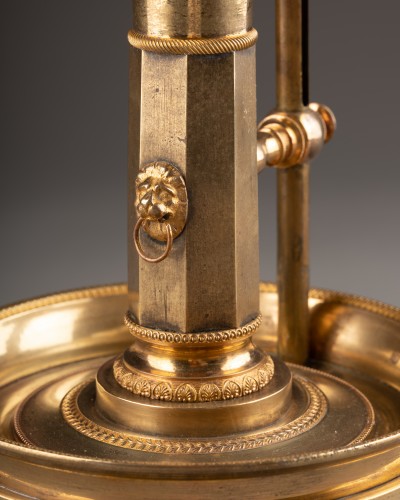 An Empire gilt-bronze candlestick with a mechanism - Empire