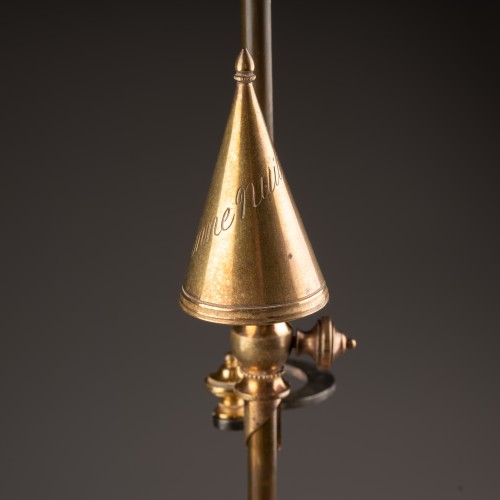 Empire - An Empire gilt-bronze candlestick with a mechanism