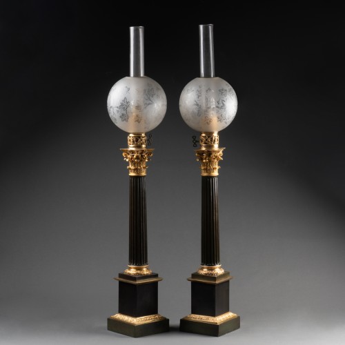 Restauration - Charles X - A pair of Restauration ormolu and patinated bronze Carcel lamps