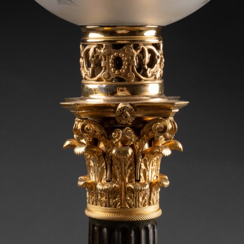 Antiquités - A pair of Restauration ormolu and patinated bronze Carcel lamps