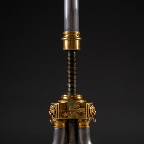  - A late 18th century polished steel and giltbronze campaign gueridon