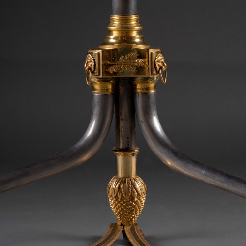 Antiquités - A late 18th century polished steel and giltbronze campaign gueridon