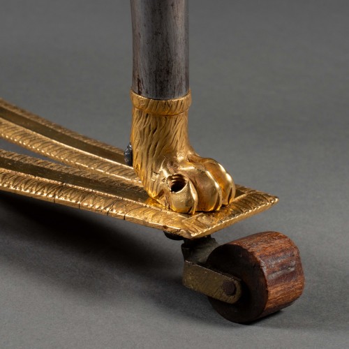 Antiquités - A late 18th century polished steel and giltbronze campaign gueridon