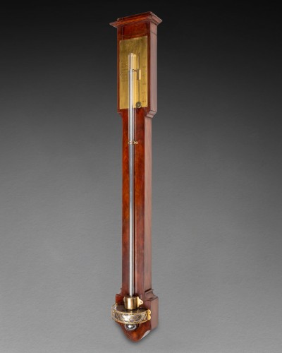 An Empire mahogany stick barometer - 