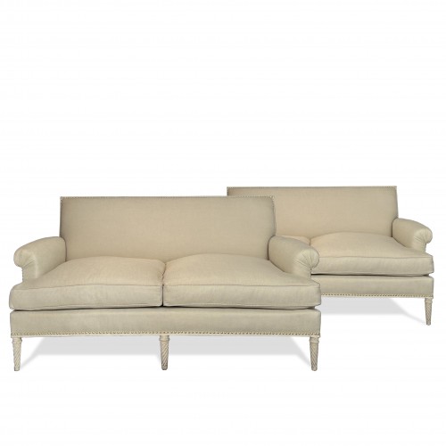 Maison Carlhian - A pair of neoclassical sofas by 1950