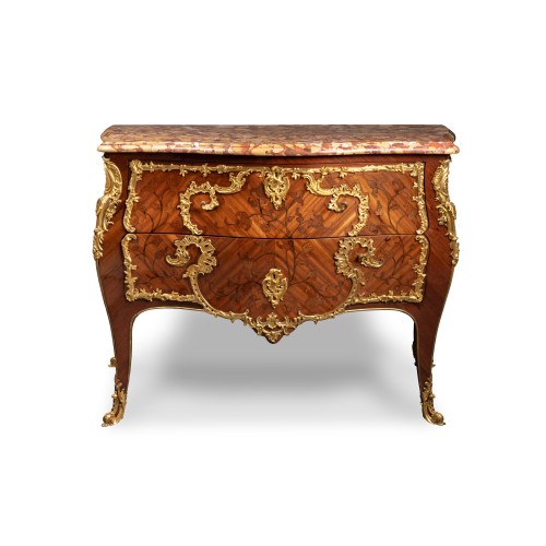 A Louis XV ormolu mounted bois de bout marquetery commode by Pierre Roussel