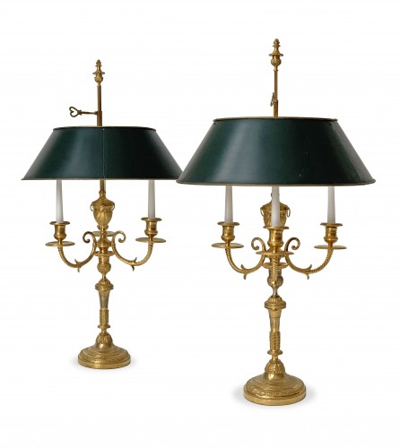 A pair of late 18th century gilt-bronze bouillotte lamps