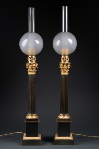 Paire de lampes Carcel en bronze doré et patiné d'époque Restauration - Galerie Philippe Guegan