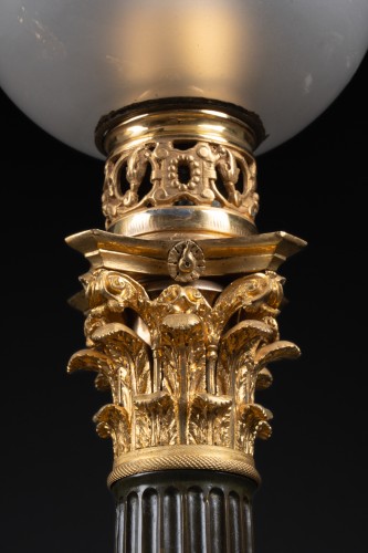 Antiquités - Paire de lampes Carcel en bronze doré et patiné d'époque Restauration