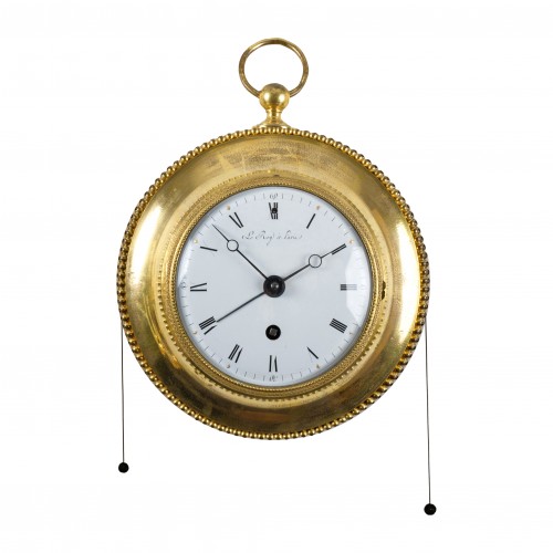 An Empire gilt-bronze alarm cartel clock