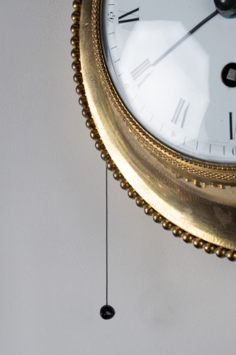 Horology  - An Empire gilt-bronze alarm cartel clock