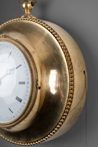 Empire - An Empire gilt-bronze alarm cartel clock