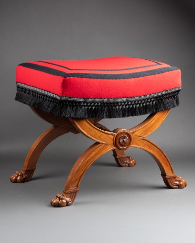 A Consulate period mahogany curule stool , with lion’s paw, by JB Demay - 