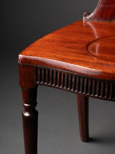 Seating  - A pair of George III Mahogany Hall Chairs in the manner of Mayhew &amp; Ince