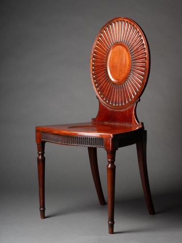 18th century - A pair of George III Mahogany Hall Chairs in the manner of Mayhew &amp; Ince