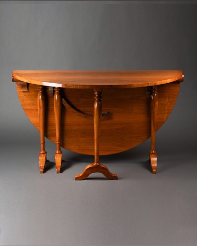  - An early 19th century Biedermeier cherrywood Gateleg Table by 1820