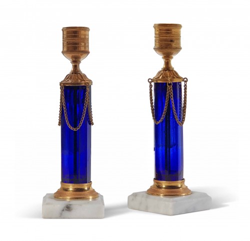 A pair of Swedish ormolu mounted cobalt blue glass candlesticks