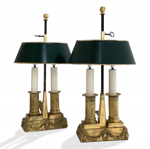 A set of two Louis XVI gilt bronze bouillotte lamps, late 18th century