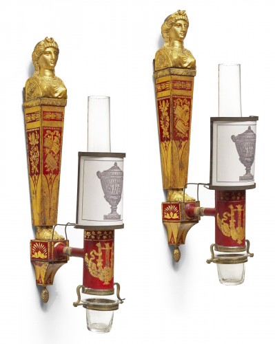 A pair of late 18th century gilt metal and scarlet tole peinte wall lights 