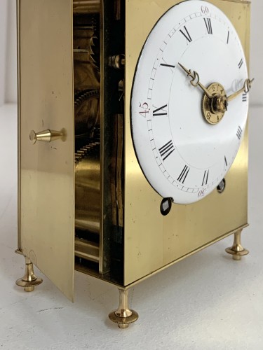 Horology  - A Louis XVI brass capucine clock