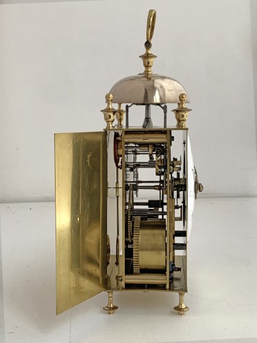 A Louis XVI brass capucine clock - 