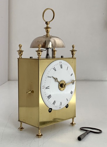 A Louis XVI brass capucine clock - 