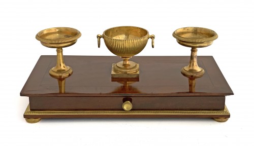 An Empire ormolu mounted mahogany inkstand