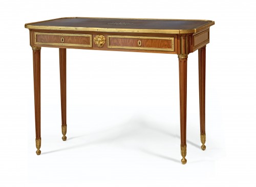 A rosewood writing table signed Escalier de Cristal