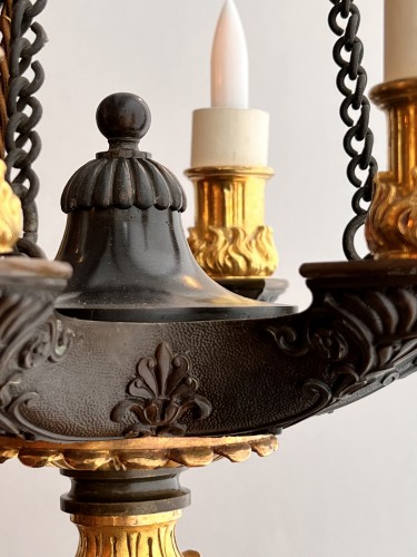 Antiquités - A six-light gilt and patinated bonze chandelier by 1820