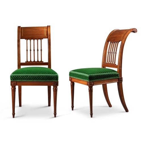 A pair of mahogany chairs in the Etruscan style signed G.IACOB