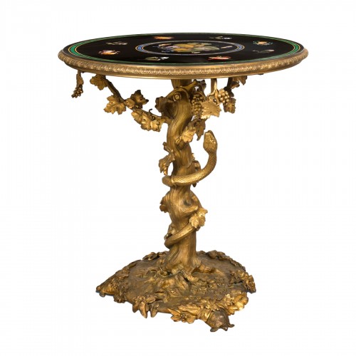 Gilt bronze pedestal table, hard stone top