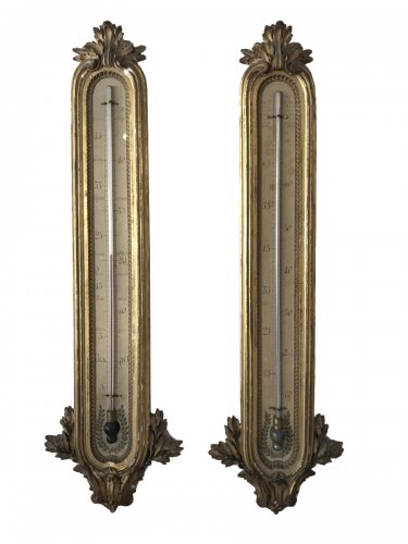 Pair of giltwood barometer-thermometer