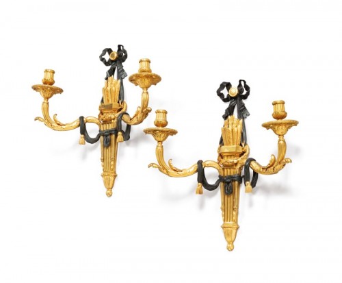 A pair of Louis XVI gilt bronze wall lights