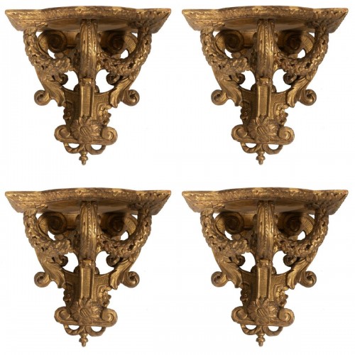 A set of four Regence wall brackets