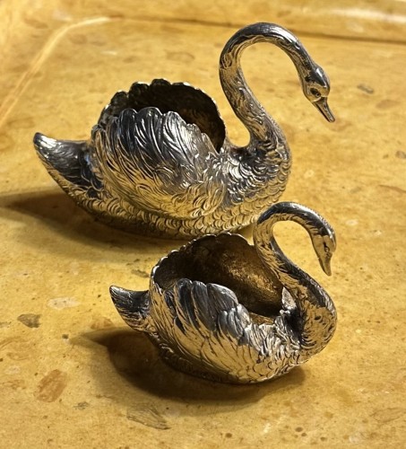  - A set of twelve silver and silver gilt swans