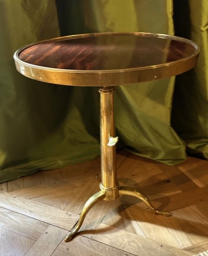 A telescopic brass and mahogany gueridon by Maison Meilleur - 